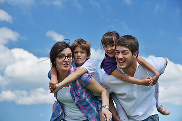 Image showing happy young family have fun outdoors