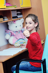 Image showing girl doing homework