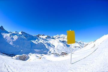 Image showing Sign board at High mountains under snow in the winter