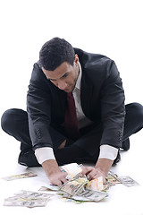 Image showing Business man holding money