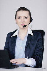 Image showing business woman group with headphones