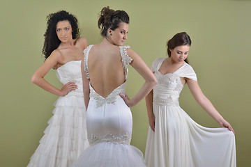 Image showing portrait of a three beautiful woman in wedding dress