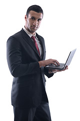 Image showing business man work on mini laptop