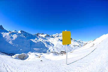 Image showing Sign board at High mountains under snow in the winter