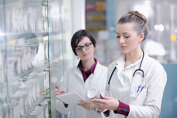 Image showing team of pharmacist chemist woman  in pharmacy drugstore