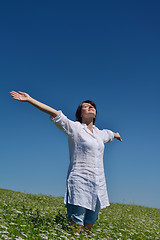 Image showing young woman in wheat field at summer