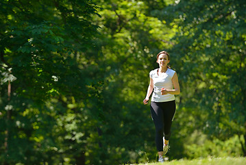 Image showing Young couple jogging