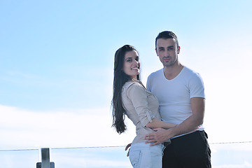 Image showing couple relaxing on balcony