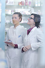 Image showing team of pharmacist chemist woman  in pharmacy drugstore