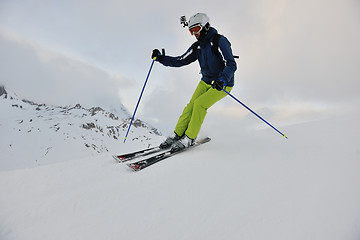 Image showing skiing on fresh snow at winter season at beautiful sunny day