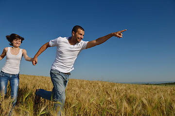 Image showing happy couple in wheat field