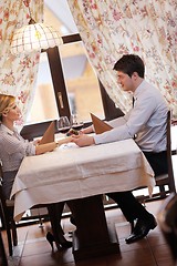 Image showing young couple having dinner at a restaurant