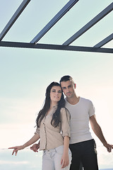 Image showing couple relaxing on balcony