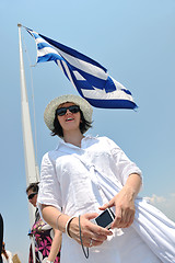 Image showing Greek woman on the streets of Oia, Santorini, Greece