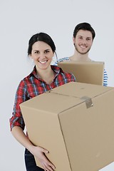 Image showing Young couple moving in new home