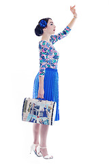 Image showing pinup retro  woman with travel bag isolated