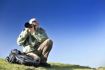 Image showing Nature photographer with digital camera