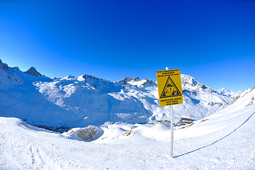 Image showing Sign board at High mountains under snow in the winter