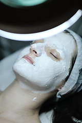 Image showing woman with facial mask in cosmetic studio