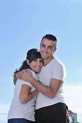 Image showing couple relaxing on balcony