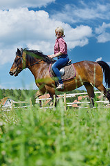 Image showing happy woman  on  horse