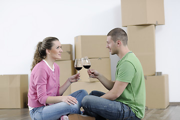 Image showing Young couple moving in new home