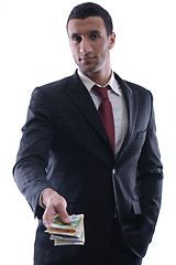 Image showing Business man holding money