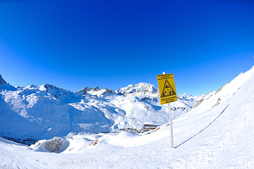 Image showing Sign board at High mountains under snow in the winter