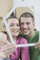 Image showing Young couple moving in new home