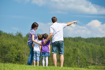 Image showing happy young family have fun outdoors