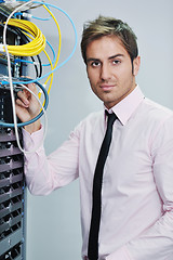 Image showing young it engineer in datacenter server room