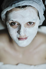 Image showing woman with facial mask in cosmetic studio