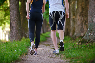 Image showing Young couple jogging