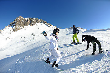 Image showing people group on snow at winter season