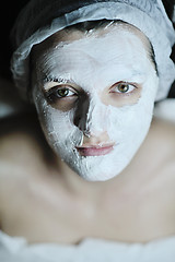 Image showing woman with facial mask in cosmetic studio