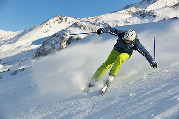 Image showing skiing on fresh snow at winter season at beautiful sunny day