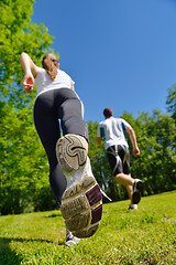 Image showing Young couple jogging