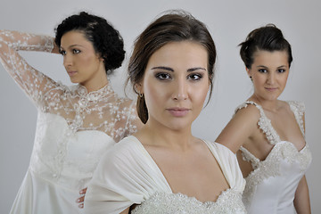 Image showing portrait of a three beautiful woman in wedding dress