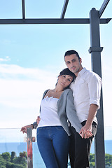 Image showing couple relaxing on balcony