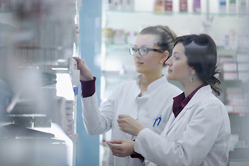 Image showing team of pharmacist chemist woman  in pharmacy drugstore