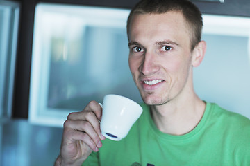 Image showing handsome young man drink fresh morning coffee