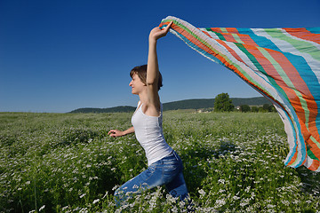 Image showing young woman in wheat field at summer