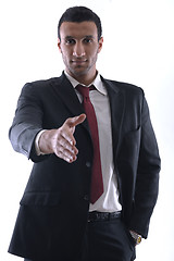 Image showing business man giving you a hand shake