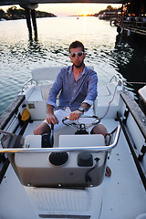 Image showing portrait of happy young man on boat