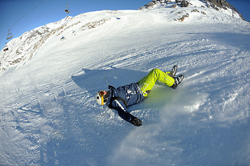 Image showing skiing on fresh snow at winter season at beautiful sunny day