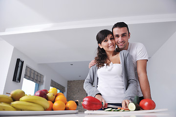 Image showing young couple have fun in modern kitchen