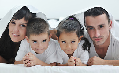 Image showing happy young Family in their bedroom