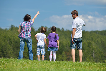 Image showing happy young family have fun outdoors