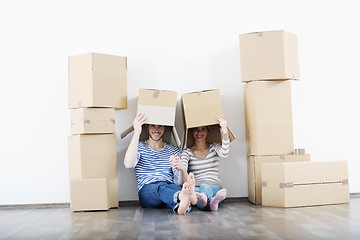 Image showing Young couple moving in new house