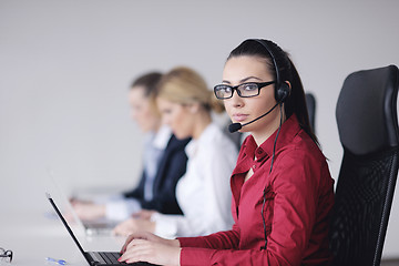 Image showing business woman group with headphones